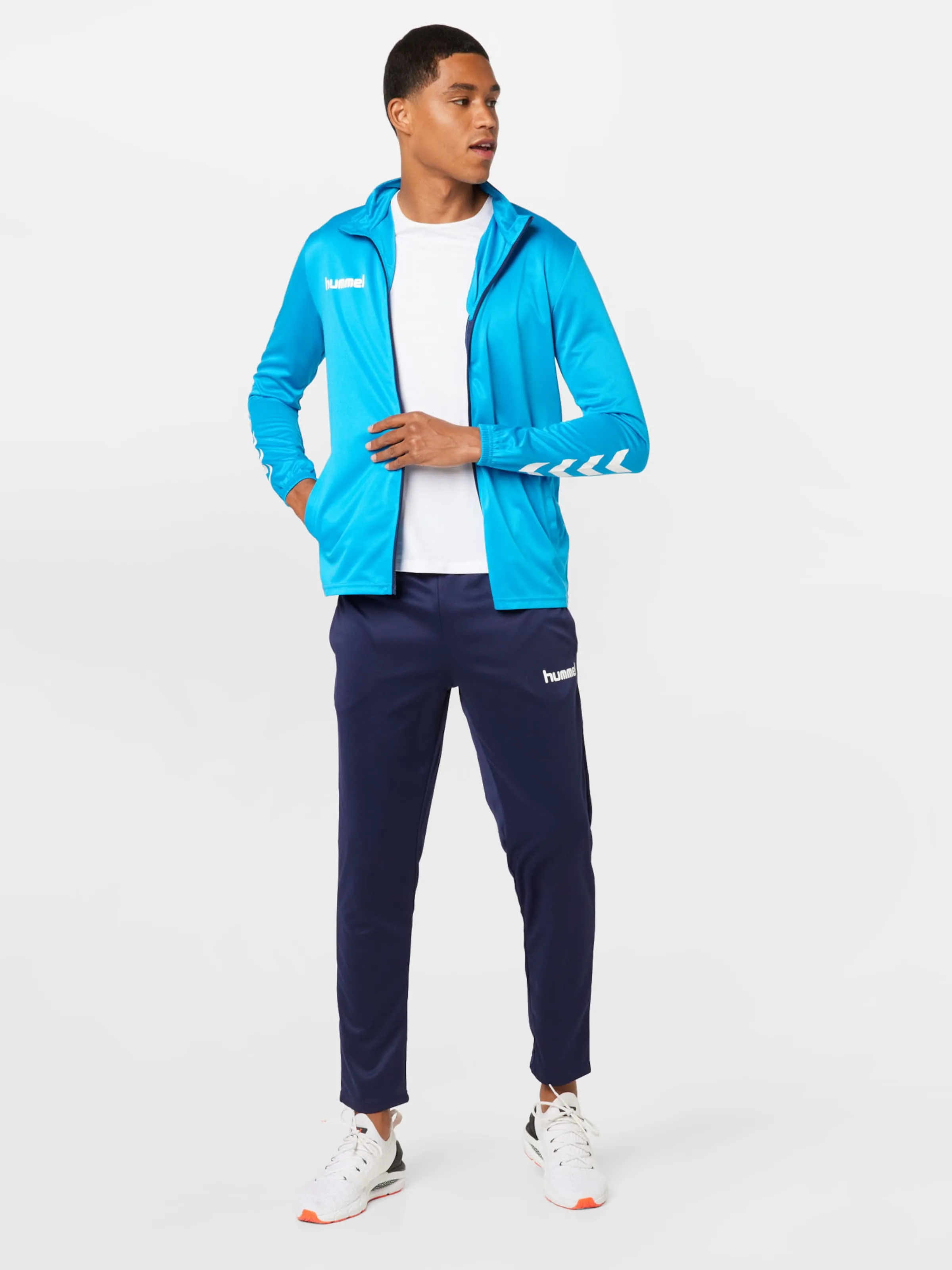 Hummel Trainingsanzug in Navy, Himmelblau