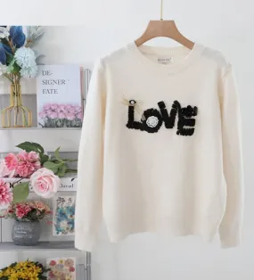 Lieber bestickter Pullover